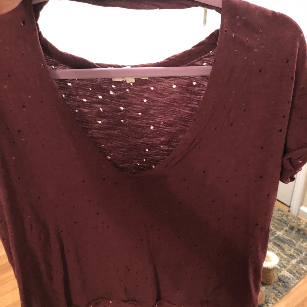 Distressed cut out knock tee